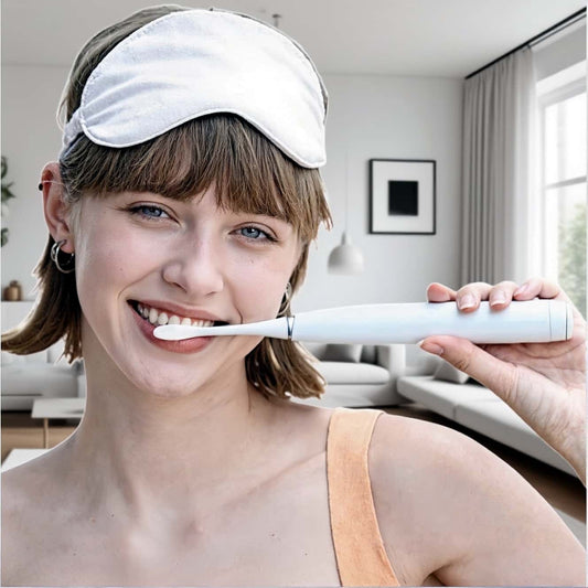 Woman Using Orateeth Flow Toothbrush at Home