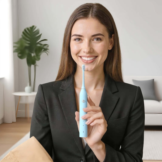 Orateeth toothbrush held by woman in home