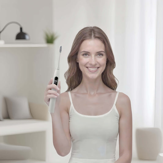 Woman Using Orateeth X Pro Elite Toothbrush at Home